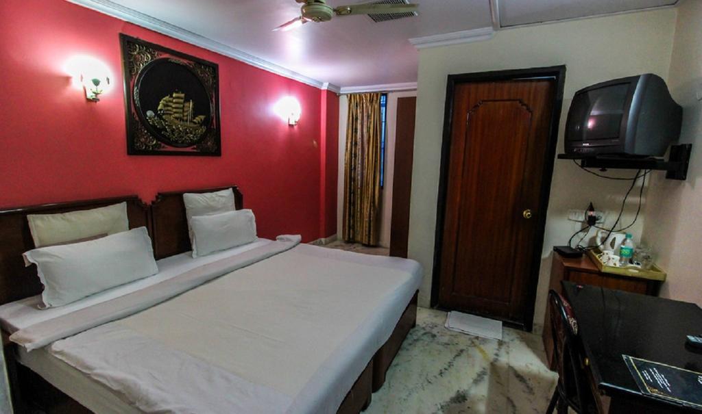 Hotel Pigeon International バンガロール 部屋 写真