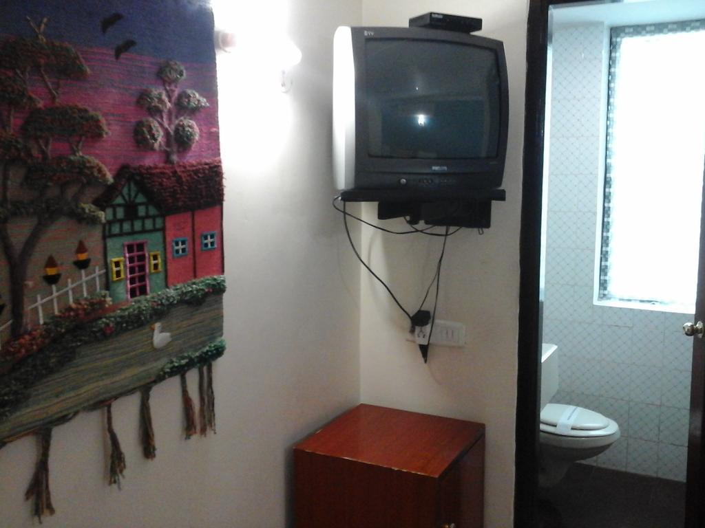Hotel Pigeon International バンガロール 部屋 写真