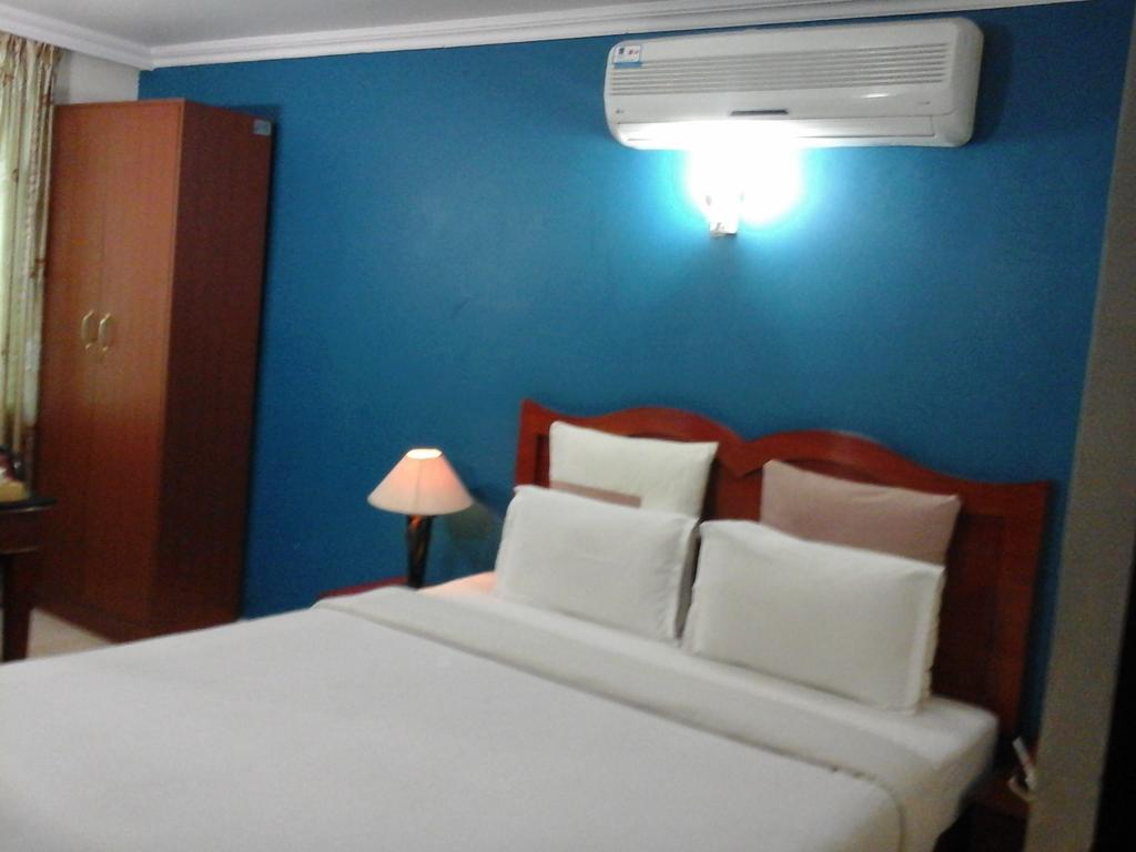 Hotel Pigeon International バンガロール 部屋 写真